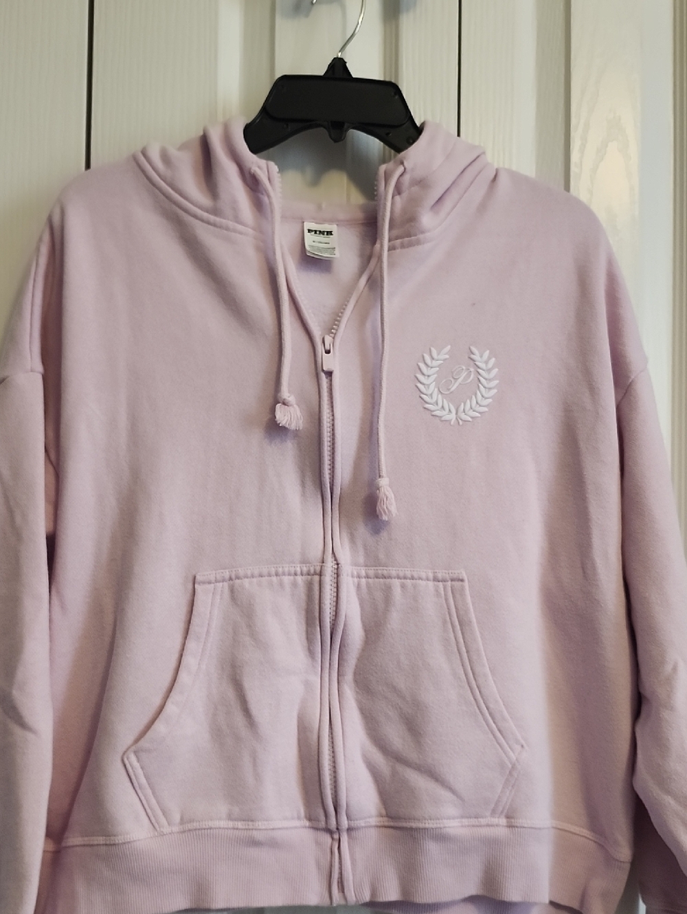 Light Pink Zip-Up Hoodie with Embroidered Crest